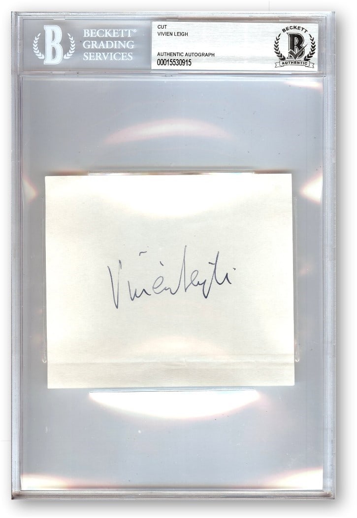 Vivien Leigh Autographed Cut Signature Gone with the Wind Beckett Authenticated 6 x 9: Vivien Leigh Autographed Cut Signature Gone with the Wind Beckett Authenticated 6 x 9 This is an authentic cut signature of Vivien Leigh, famously known for her role in "Gone with the Wind." The signa