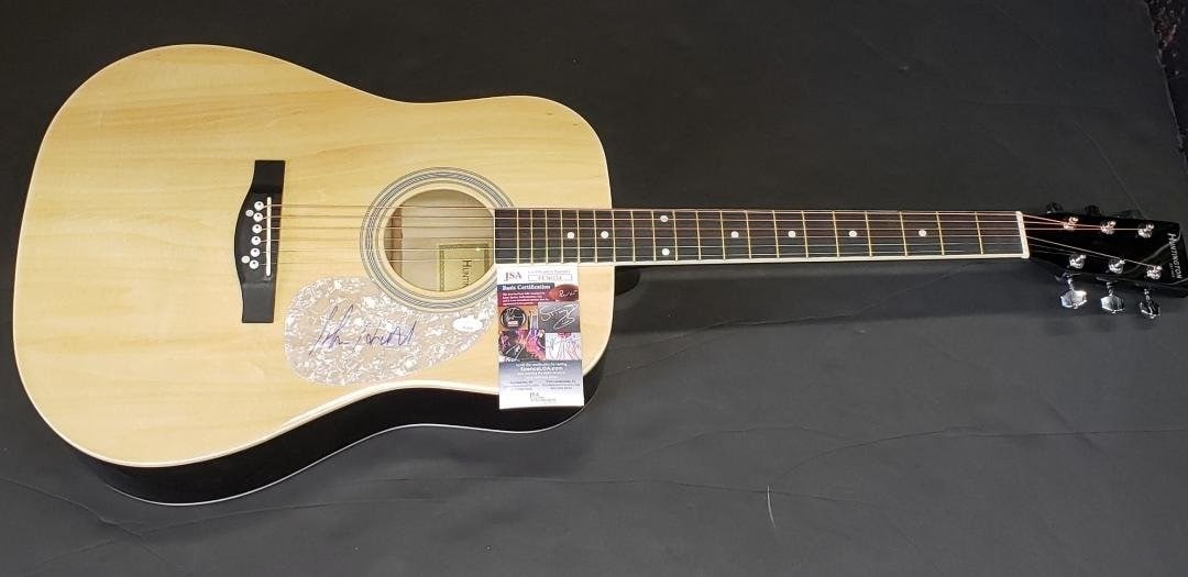 John Hiatt Signed Acoustic Guitar with JSA Authentication: John Hiatt Signed Acoustic Guitar with JSA Authentication This is an original acoustic guitar autographed by renowned country star John Hiatt. The signature has been authenticated by James Spence Auth