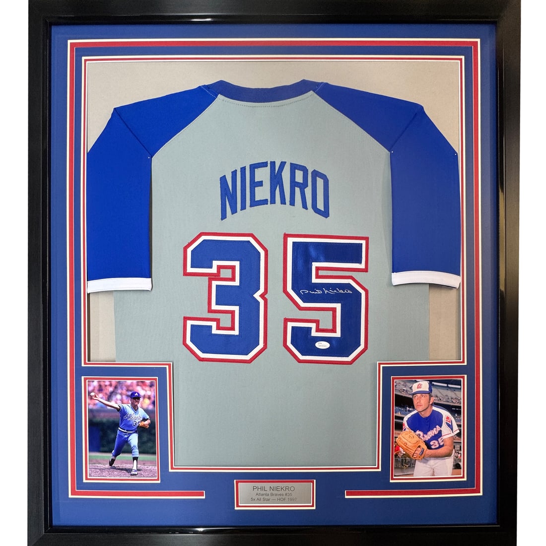 Framed Phil Niekro Autographed Atlanta Braves Jersey JSA Certified 33x42: Framed Phil Niekro Autographed Atlanta Braves Jersey JSA Certified 33x42 This stunning framed jersey showcases the autograph of baseball legend Phil Niekro, a celebrated player of the Atlanta Braves.