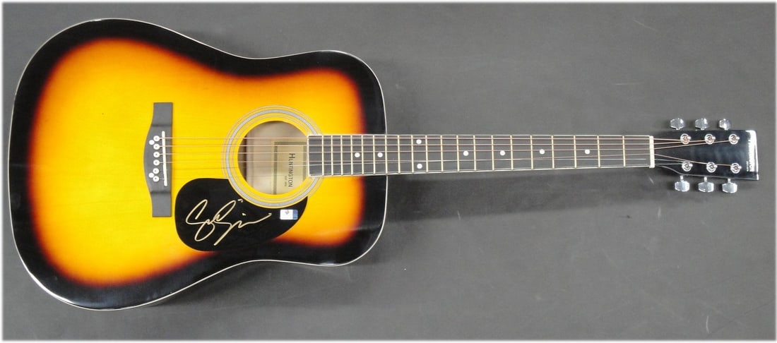 Sam Smith Autographed Acoustic Guitar with Global Authentics Certificate: Sam Smith Autographed Acoustic Guitar with Global Authentics Certificate This is an authentic Sam Smith autographed acoustic guitar, providing a unique piece for any music enthusiast or collector. The