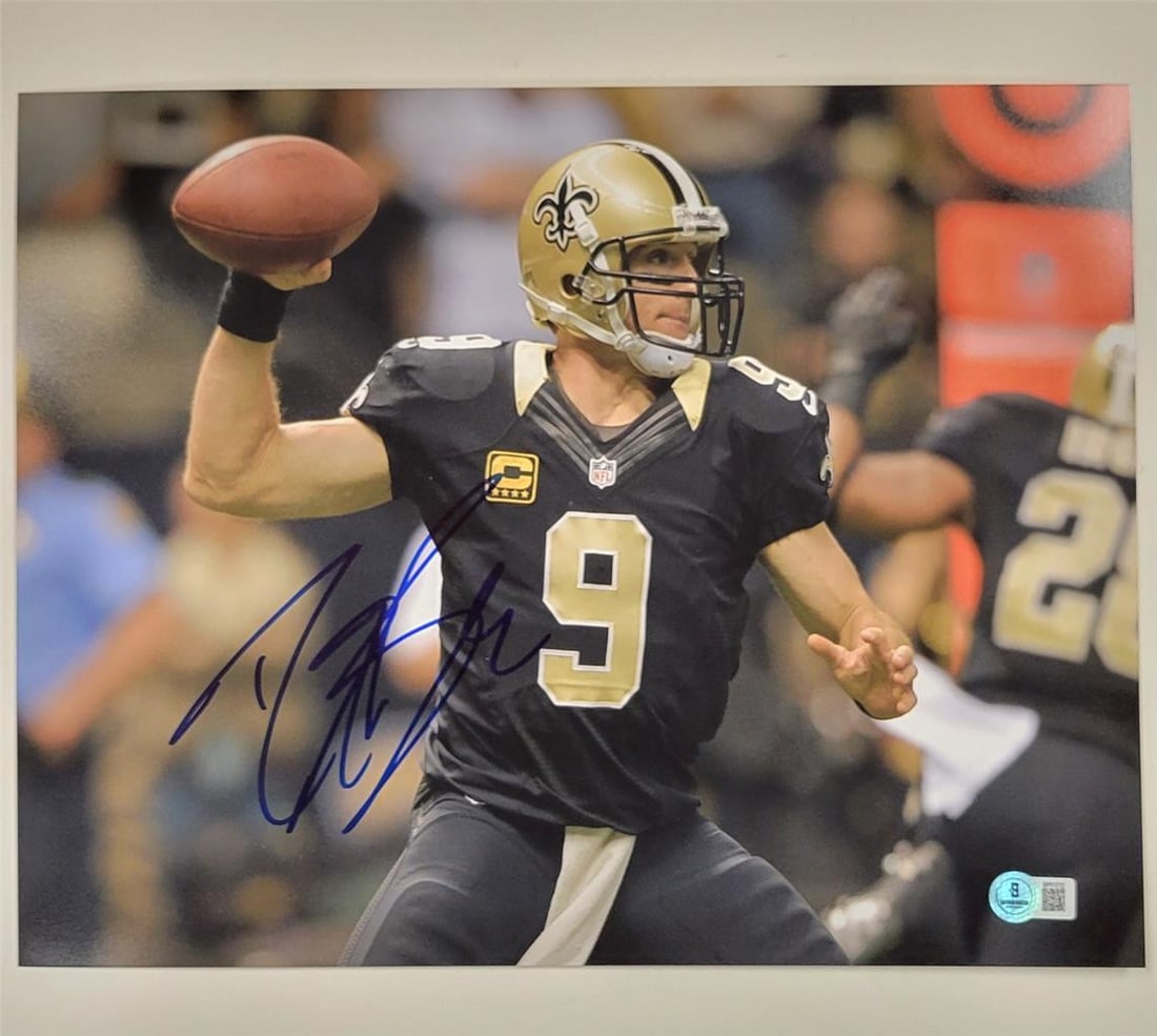 Drew Brees Signed 11x14 Photo New Orleans Saints BAS Certified: Drew Brees Signed 11x14 Photo New Orleans Saints BAS Certified This is an original signed 11x14 photograph of Drew Brees, the legendary quarterback of the New Orleans Saints. The autograph has been au