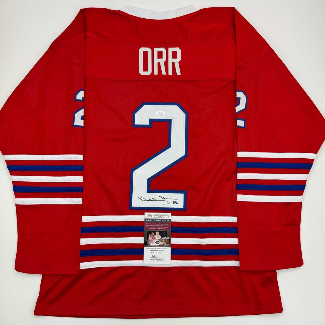 Bobby Orr Autographed Oshawa Generals Hockey Jersey with JSA COA: Bobby Orr Autographed Oshawa Generals Hockey Jersey with JSA COA This is an autographed Bobby Orr Oshawa Generals red hockey jersey, featuring the name and number of the legendary player. The jersey i
