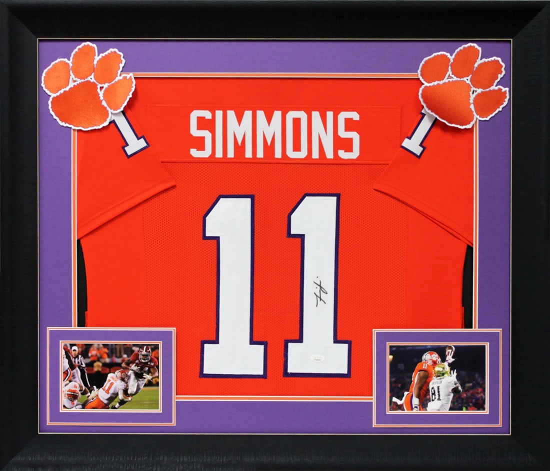 Isaiah Simmons Signed Clemson Tigers Framed Orange Jersey with JSA Authentication: Isaiah Simmons Signed Clemson Tigers Framed Orange Jersey with JSA Authentication Celebrate your support for the Clemson Tigers with this autographed orange pro style framed jersey signed by Isaiah Si