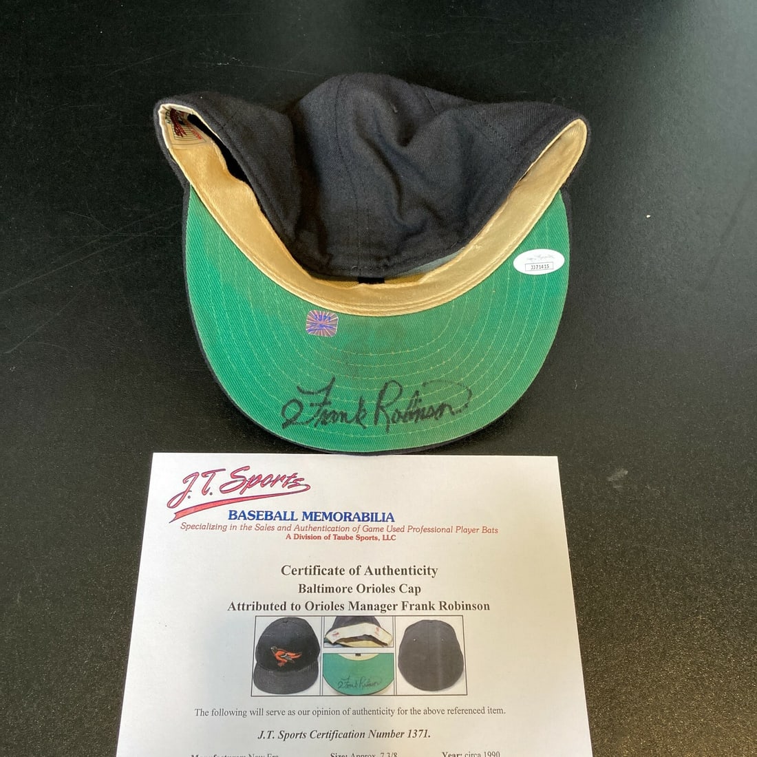 Frank Robinson Signed 1990 Orioles Game Used Hat with JSA & J.T. Sports COA: Frank Robinson Signed 1990 Orioles Game Used Hat with JSA & J.T. Sports COA This is a game-used hat from the 1990 season, signed by baseball legend Frank Robinson, who managed the Baltimore Orioles du