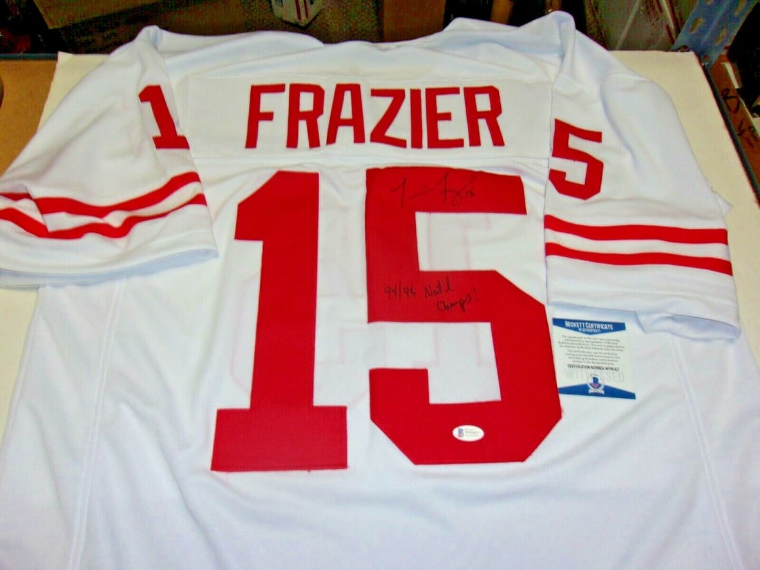 Tommie Frazier Signed Jersey Nebraska Cornhuskers 94/95 National Champs Beckett COA: Tommie Frazier Signed Jersey Nebraska Cornhuskers 94/95 National Champs Beckett COA Celebrate the legacy of Tommie Frazier with this original signed Nebraska Cornhuskers jersey, commemorating the 1994