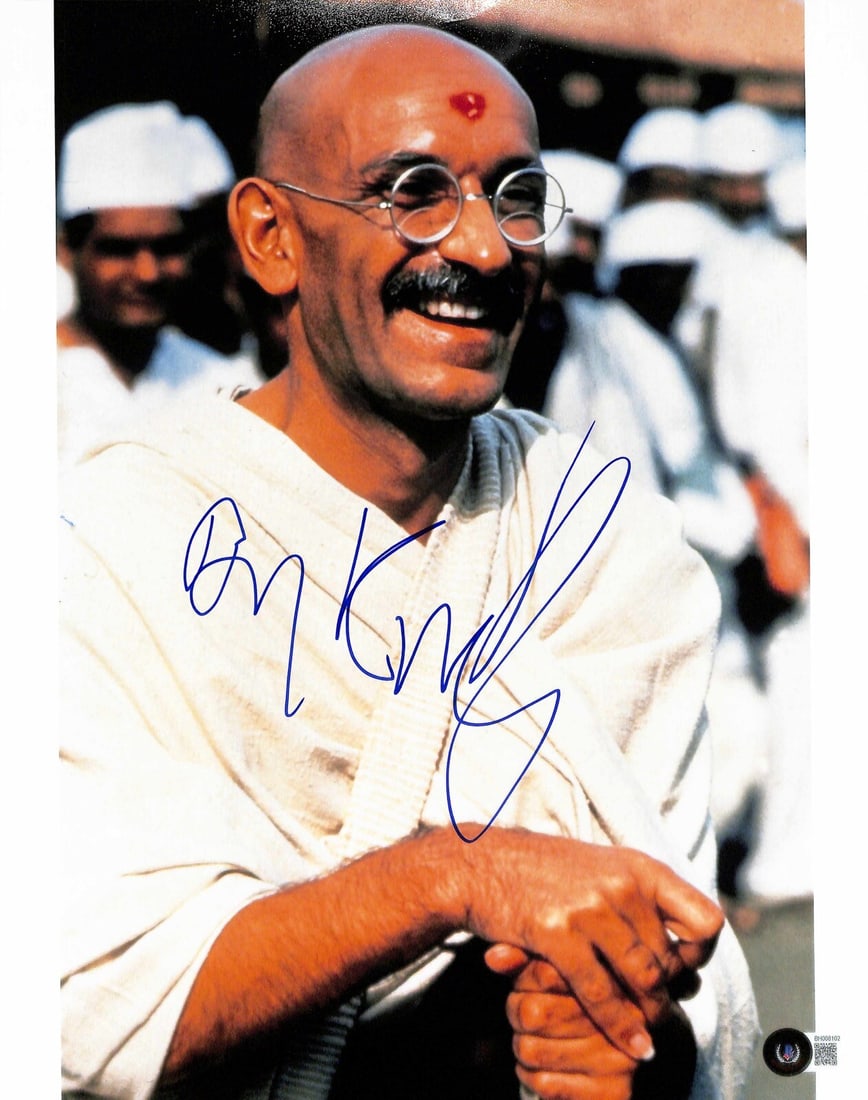 Ben Kingsley Signed 11x14 Gandhi Photo Beckett Authenticated: Ben Kingsley Signed 11x14 Gandhi Photo Beckett Authenticated This autographed 11x14 color photograph captures Ben Kingsley in his iconic role as Gandhi. The photograph is signed in blue permanent mark