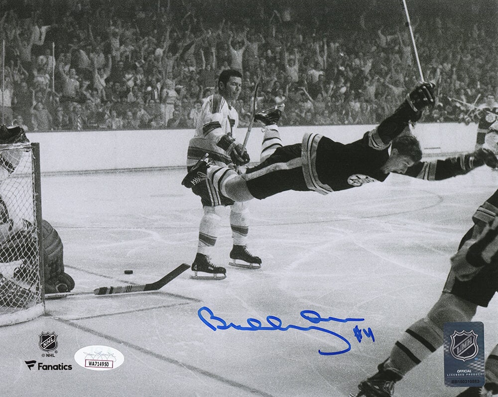Bobby Orr Signed 8x10 Boston Bruins Action Photo with JSA COA: Bobby Orr Signed 8x10 Boston Bruins Action Photo with JSA COA Capture a moment in hockey history with this authentic 8x10 black and white photo of Bobby Orr in action with the Boston Bruins. This sign