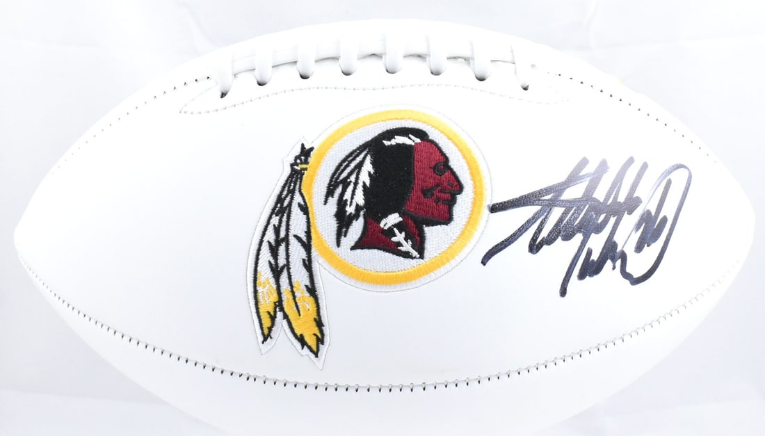Adrian Peterson Signed Washington Football with Beckett Hologram: Adrian Peterson Signed Washington Football with Beckett Hologram This is an original Washington logo football autographed by Adrian Peterson, an iconic player in the sport. The ball is a remarkable