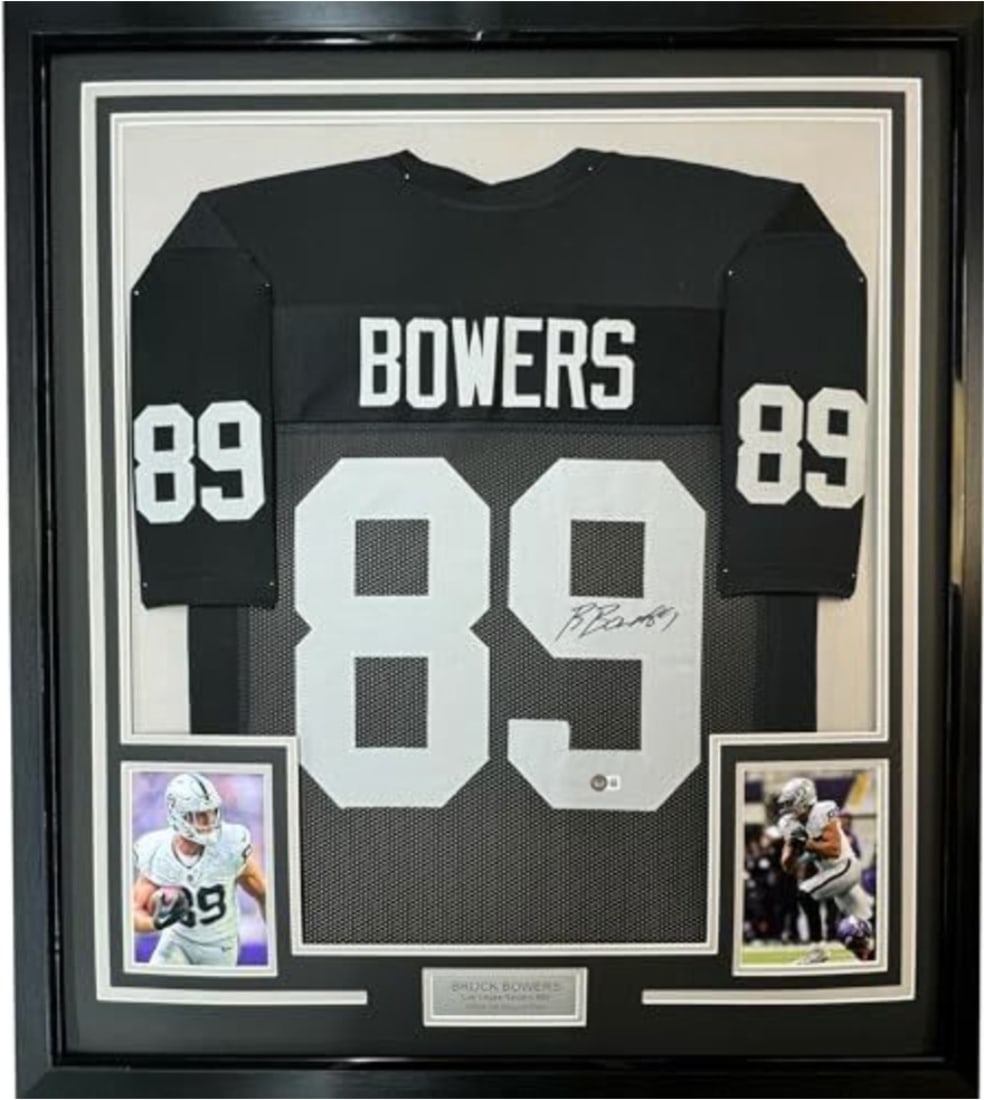 Framed Autographed Brock Bowers Jersey 35x39 Las Vegas Raiders Beckett COA: Framed Autographed Brock Bowers Jersey 35x39 Las Vegas Raiders Beckett COA This professionally framed and matted piece features an autographed Brock Bowers Las Vegas Raiders black jersey, measuring 35