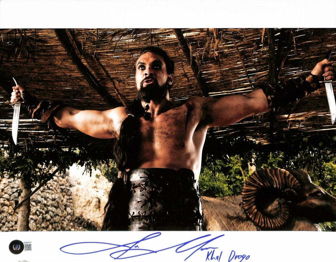 Jason Momoa Khal Drogo Signed 11x14 Photo Beckett Certified: Jason Momoa Khal Drogo Signed 11x14 Photo Beckett Certified This stunning 11x14 photograph features Jason Momoa, known for his iconic role as "Khal Drogo" in the acclaimed TV series Game of Thrones. T