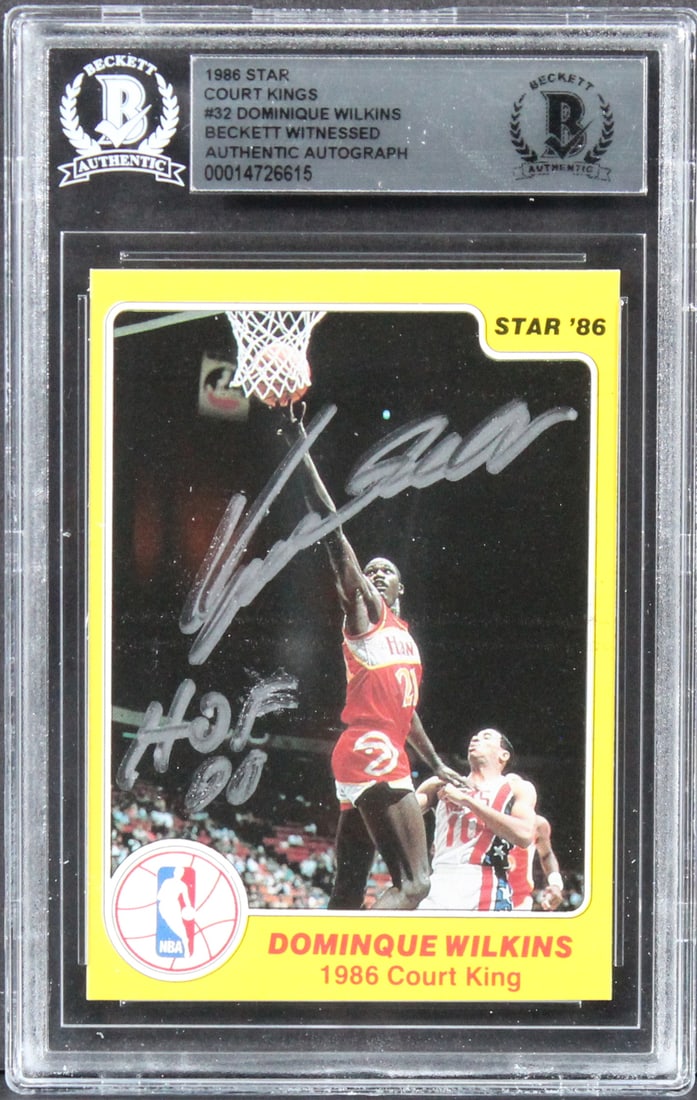 Dominique Wilkins Signed 1986 Star Court Kings #32 HOF 06 BAS Slabbed: Dominique Wilkins Signed 1986 Star Court Kings #32 HOF 06 BAS Slabbed This is a signed 1986 Star Court Kings #32 card featuring Dominique Wilkins of the Atlanta Hawks, inscribed with "HOF 06". The ite