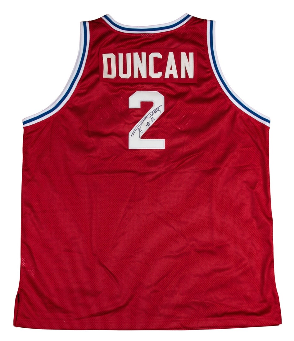 Tim Duncan Signed St. Dunstan's Demons Jersey Beckett Authenticated: Tim Duncan Signed St. Dunstan's Demons Jersey Beckett Authenticated This is an original St. Dunstan's Demons red basketball jersey signed by Tim Duncan, the legendary Hall of Fame center and power for