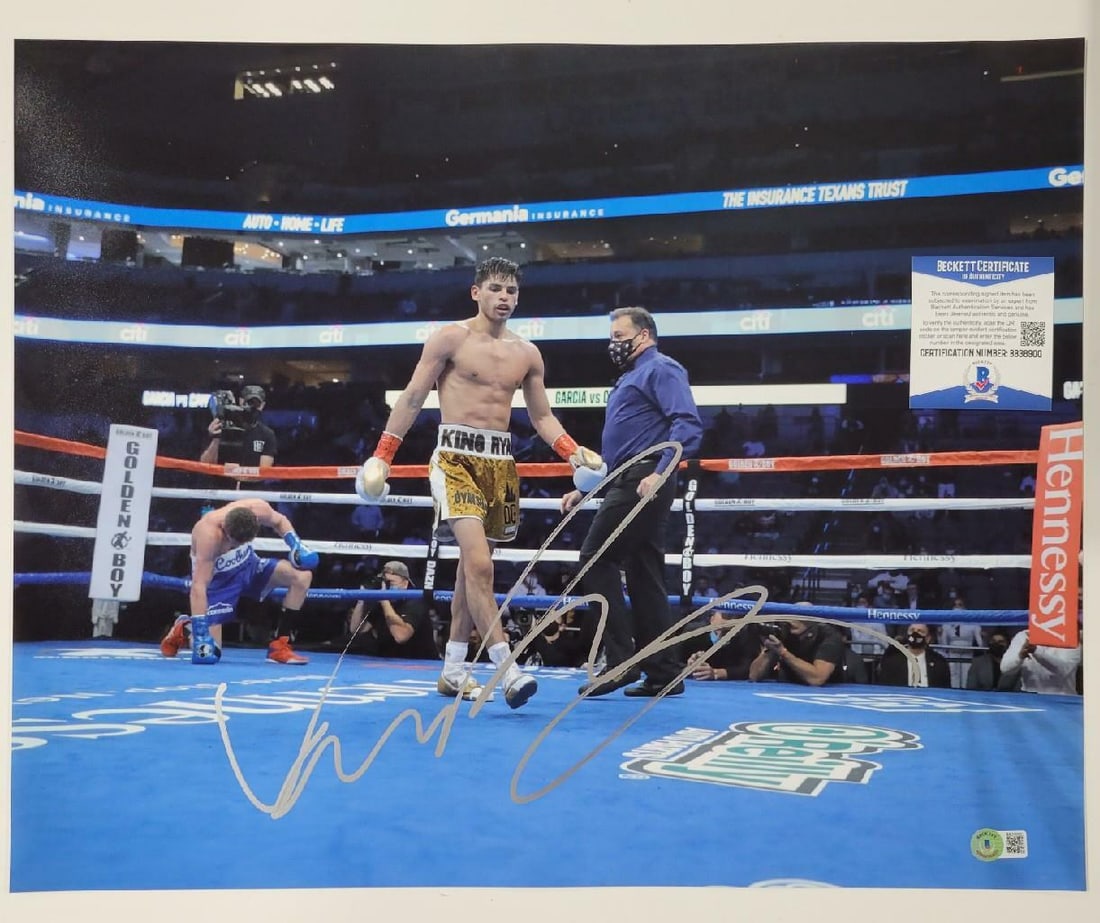 Ryan Garcia Signed 16x20 Boxing Photo Beckett BAS Authenticated: Ryan Garcia Signed 16x20 Boxing Photo Beckett BAS Authenticated This is an original signed 16x20 photo of boxing star Ryan Garcia, authenticated by Beckett Authentication Services (BAS). The photo cap