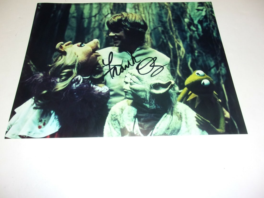 Frank Oz Signed Yoda 11x14 Photo Star Wars COA: Frank Oz Signed Yoda 11x14 Photo Star Wars COA This stunning 11x14 photo features Yoda from the iconic Star Wars: Empire Strikes Back, signed by the legendary Frank Oz. Accompanied by a Certificate of