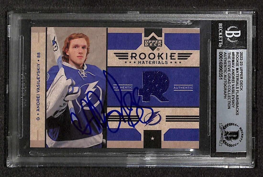 Andrei Vasilevskiy Signed 2022/23 Upper Deck Rookie Materials Beckett Authenticated Card: Andrei Vasilevskiy Signed 2022/23 Upper Deck Rookie Materials Beckett Authenticated Card This is an autographed 2022/23 Upper Deck Rookie Materials sports trading card signed by Andrei Vasilevskiy of