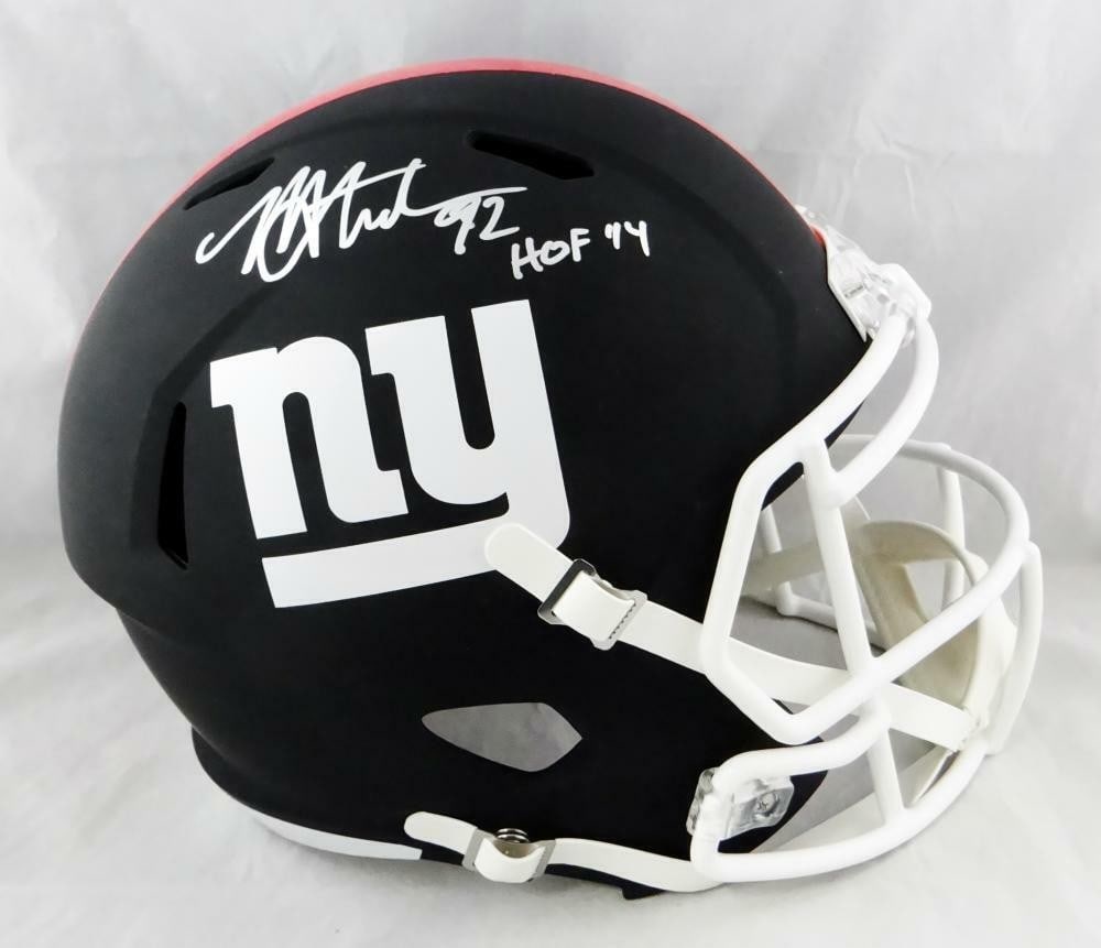 Michael Strahan Autographed NY Giants Flat Black Helmet Beckett Certified: Michael Strahan Autographed NY Giants Flat Black Helmet Beckett Certified This is an original full-size flat black helmet signed by Michael Strahan, the legendary football player, known for his impres