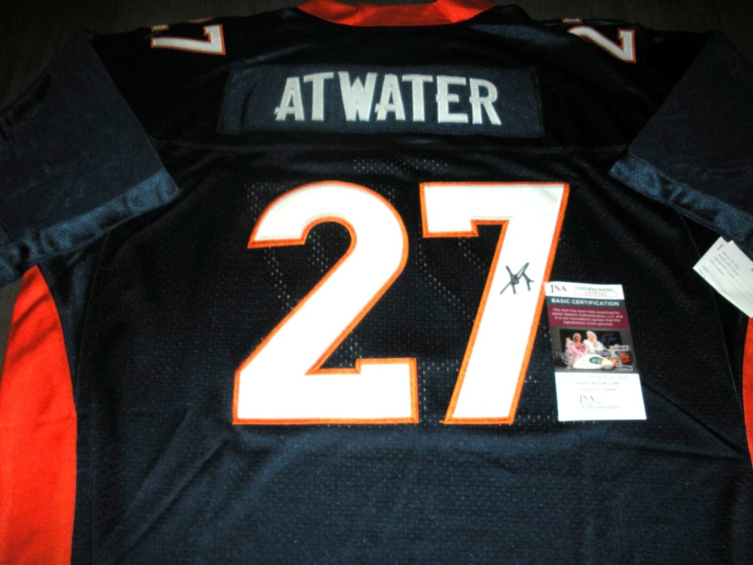 Steve Atwater Signed Mitchell & Ness Jersey with JSA COA: Steve Atwater Signed Mitchell & Ness Jersey with JSA COA This officially licensed Mitchell & Ness jersey is a must-have for any football enthusiast. It features the signature of Steve Atwater, a promi