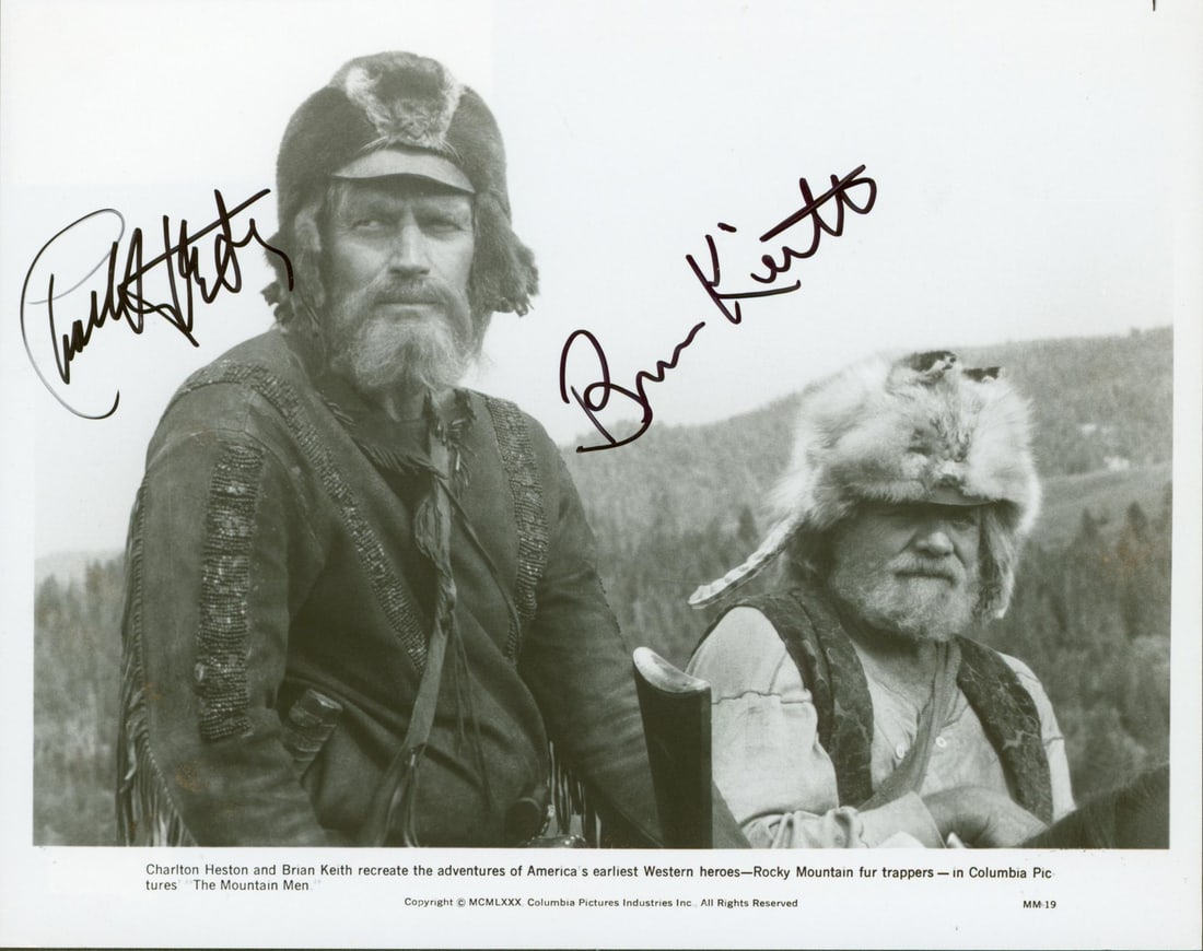 Charlton Heston Brian Keith Signed 8x10 Photo The Mountain Men Beckett COA: Charlton Heston Brian Keith Signed 8x10 Photo The Mountain Men Beckett COA This autographed 8x10 photograph features the legendary Charlton Heston and Brian Keith from the classic film "The Mountain M