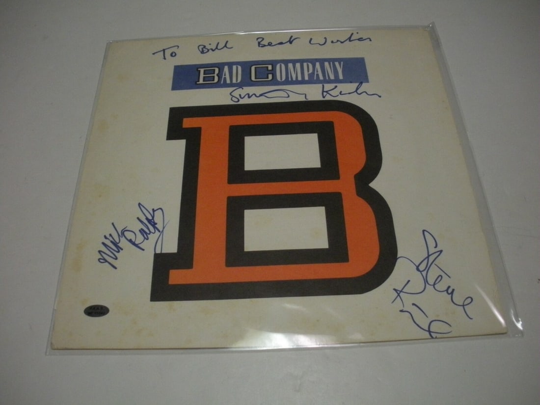 Bad Company Signed LP Record with Todd Mueller COA: Bad Company Signed LP Record with Todd Mueller COA This is an original signed LP record album by Bad Company, featuring three signatures including that of Todd Mueller. The album is in pre-owned condi