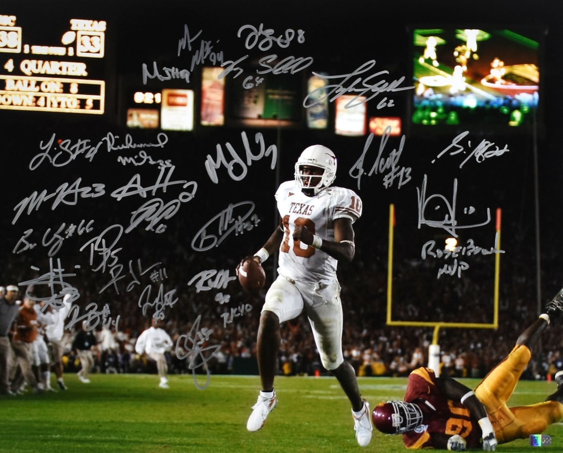 2005 Texas Longhorns Signed 16x20 Touchdown Run Photo: 2005 Texas Longhorns Signed 16x20 Touchdown Run Photo This is an original autographed 16x20 photo capturing a thrilling touchdown run by the 2005 Texas Longhorns football team. The photo is a remarkab