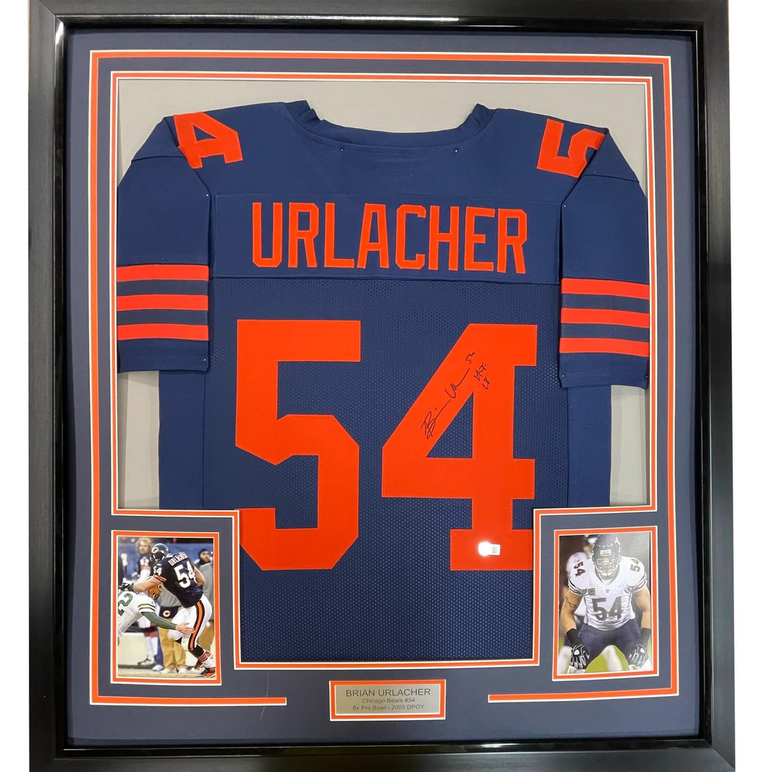 Framed Autographed Brian Urlacher Blue Retro Jersey HOF 18 BAS COA: Framed Autographed Brian Urlacher Blue Retro Jersey HOF 18 BAS COA This stunning framed autographed jersey features Brian Urlacher, the legendary NFL linebacker of the Chicago Bears. Measuring 33" x 4