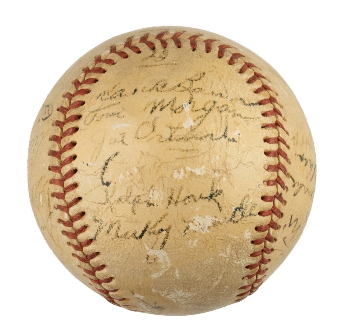 1952 New York Yankees Team Signed Baseball Mickey Mantle JSA Authenticated: 1952 New York Yankees Team Signed Baseball Mickey Mantle JSA Authenticated Celebrate the legacy of the 1952 New York Yankees with this original autographed baseball. This Official American League Harr