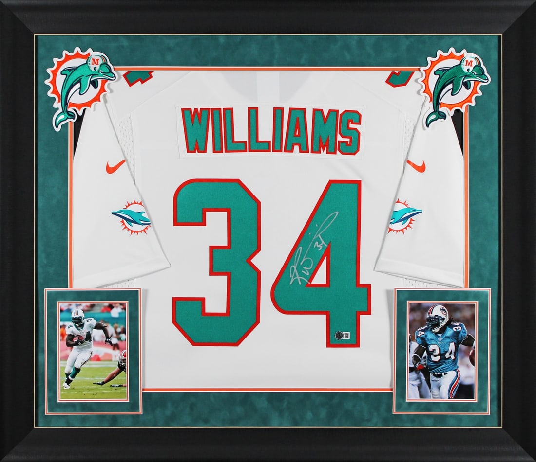 Ricky Williams Signed Miami Dolphins Framed White Nike Jersey BAS Witnessed: Ricky Williams Signed Miami Dolphins Framed White Nike Jersey BAS Witnessed Celebrate the legacy of Ricky Williams with this stunning autographed white Nike Limited framed jersey from the Miami Dolphi