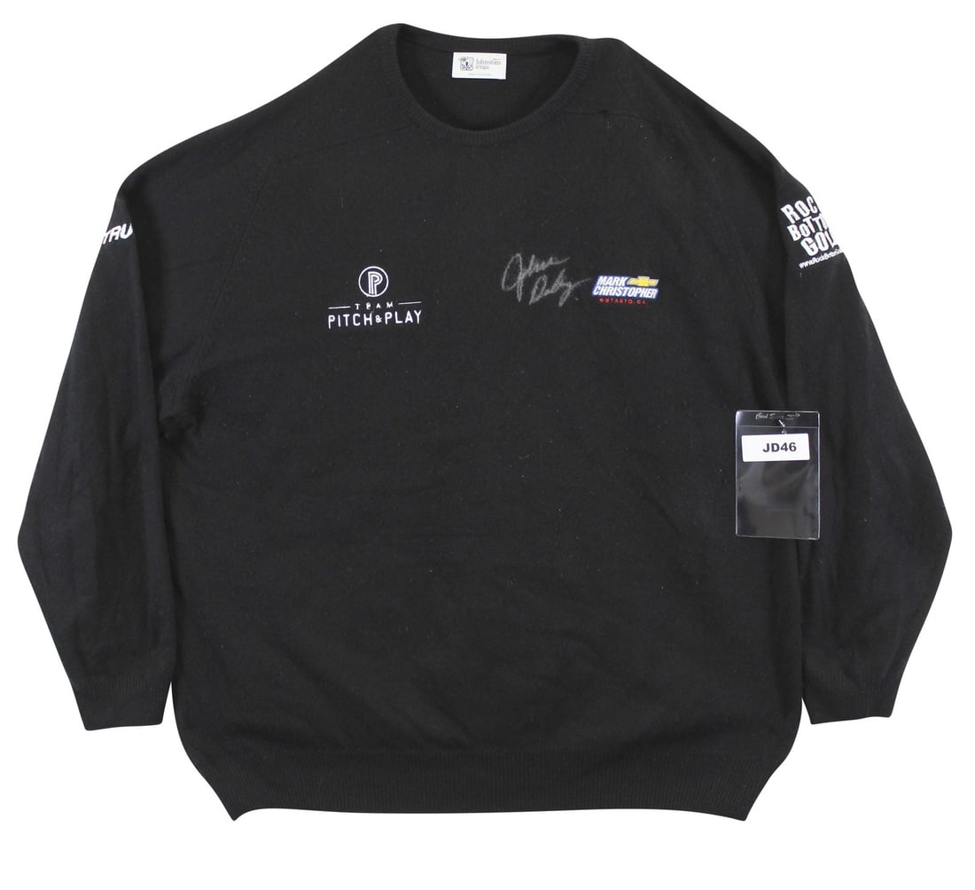 John Daly Signed Match Worn Black Cashmere Sweater Beckett Authenticated: John Daly Signed Match Worn Black Cashmere Sweater Beckett Authenticated This original black cashmere sweater, crafted by Johnstons of Elgin, is a remarkable piece worn by professional golfer John Dal
