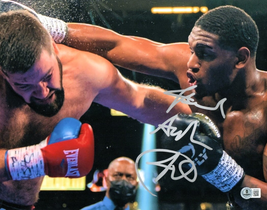 Jared Anderson Autographed 11x14 Boxing Photo Beckett Authenticated: Jared Anderson Autographed 11x14 Boxing Photo Beckett Authenticated This is an authentic 11x14 photograph of boxer Jared Anderson, featuring his signature. The photo is a great collectible for boxing