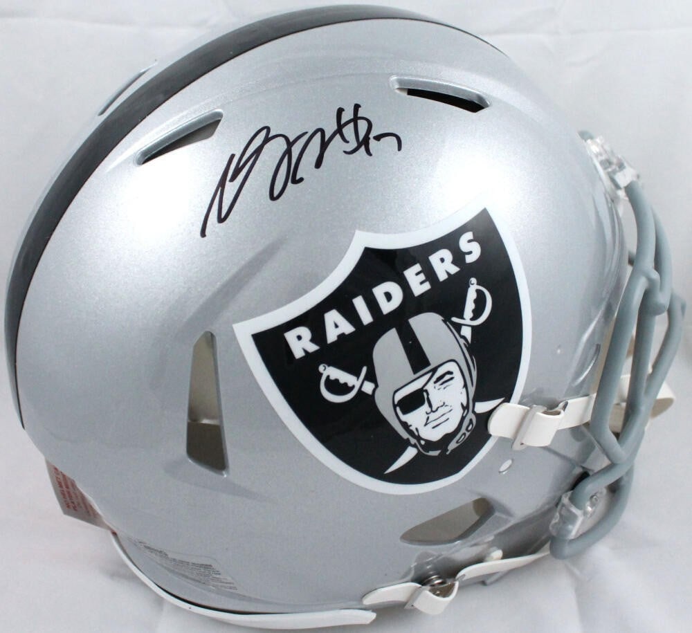 Davante Adams Signed Raiders Authentic Speed Helmet Beckett Holo: Davante Adams Signed Raiders Authentic Speed Helmet Beckett Holo This authentic full-size helmet features the signature of Davante Adams, the standout player for the Las Vegas Raiders. The item is ori
