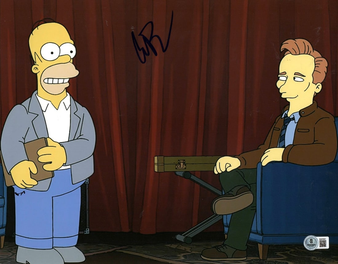 Conan O'Brien Autographed 11x14 Photo The Simpsons Beckett Authenticated: Conan O'Brien Autographed 11x14 Photo The Simpsons Beckett Authenticated This is an original 11X14 photograph signed by Conan O'Brien, known for his work as a writer on The Simpsons. The autograph is