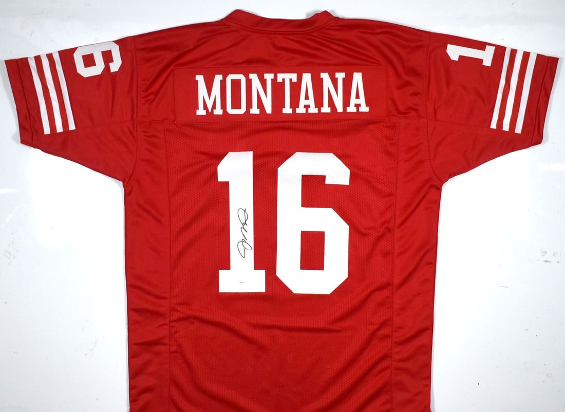Red Football Jersey Signed by Joe Montana with JSA Authentication: Red Football Jersey Signed by Joe Montana with JSA Authentication This red pro style jersey features the autograph of legendary football player Joe Montana. The jersey is associated with the San Franc