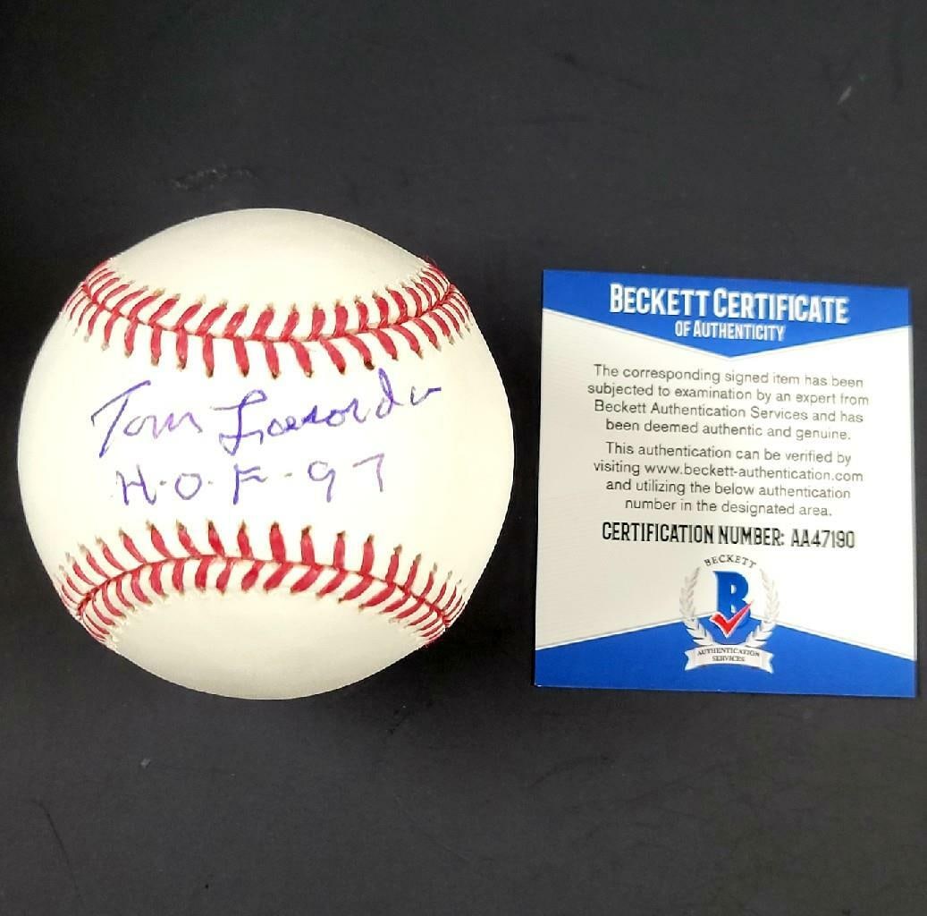 Tommy Lasorda Signed Rawlings OML Baseball HOF 97 Dodgers BAS COA: Tommy Lasorda Signed Rawlings OML Baseball HOF 97 Dodgers BAS COA This is an authentic Rawlings OML baseball signed by the legendary Tommy Lasorda, featuring the inscription "HOF 97". The baseball is