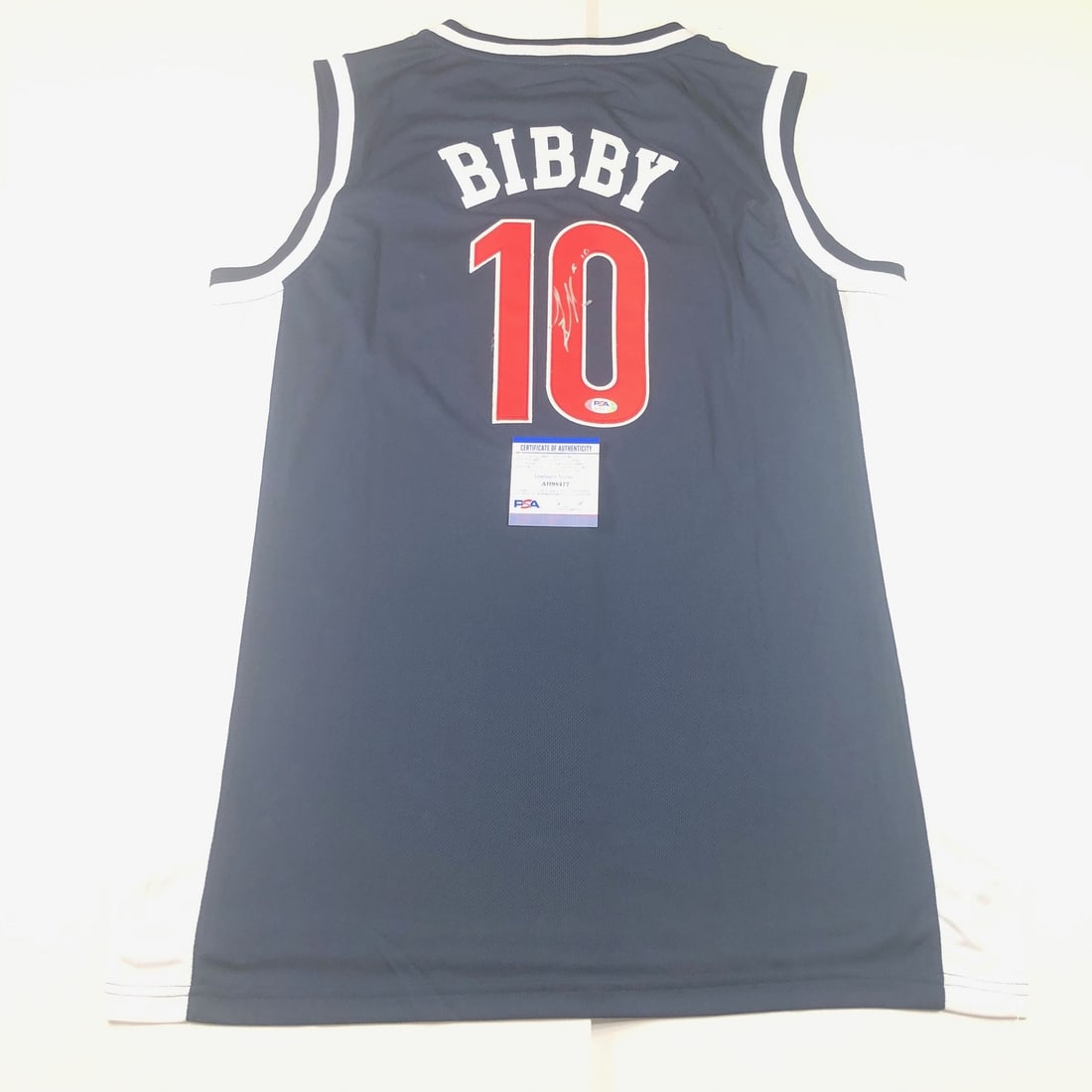 Mike Bibby Arizona Wildcats Signed Jersey PSA/DNA Authenticated: Mike Bibby Arizona Wildcats Signed Jersey PSA/DNA Authenticated This original stitched jersey is autographed by Mike Bibby, a standout player for the Arizona Wildcats. The signature has been authentic