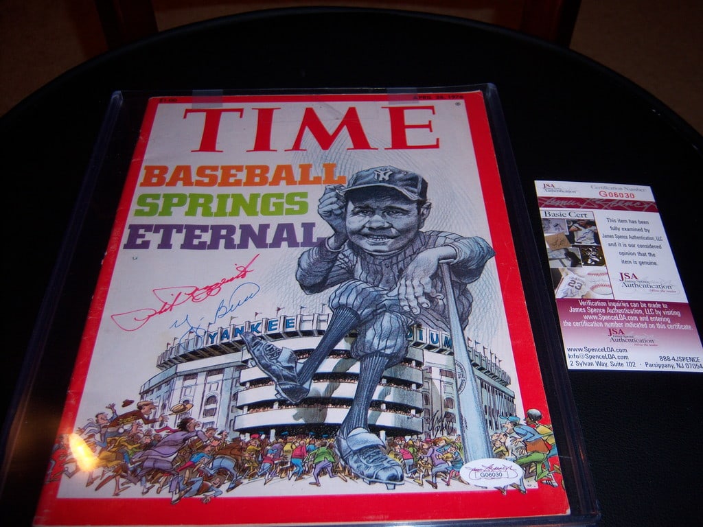 Phil Rizzuto Yogi Berra Signed Time Magazine JSA Certified: Phil Rizzuto Yogi Berra Signed Time Magazine JSA Certified This original Time magazine features the iconic signatures of baseball legends Phil Rizzuto and Yogi Berra, authenticated by JSA/COA. A must-