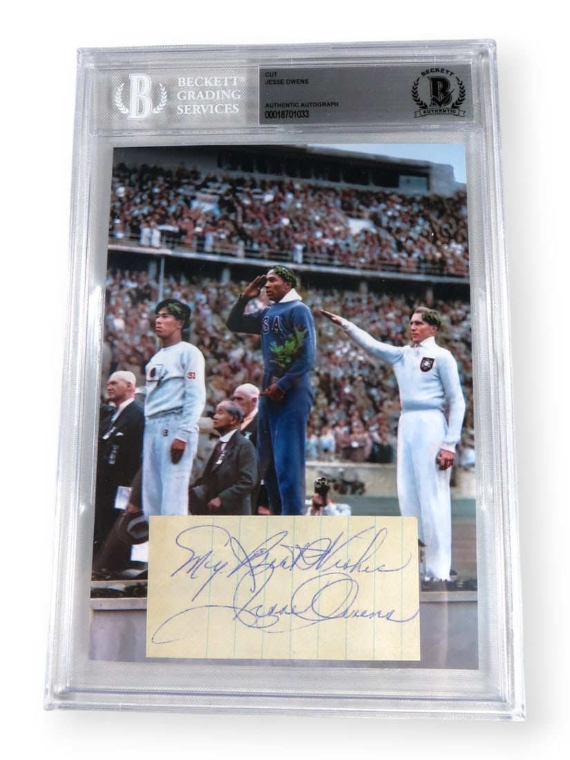 Jesse Owens Autographed Cut with 5x7 Photo Beckett Authenticated: Jesse Owens Autographed Cut with 5x7 Photo Beckett Authenticated This is an original Jesse Owens autographed cut signature, paired with a 5x7 photo commemorating his 1936 Olympics achievement. The cut