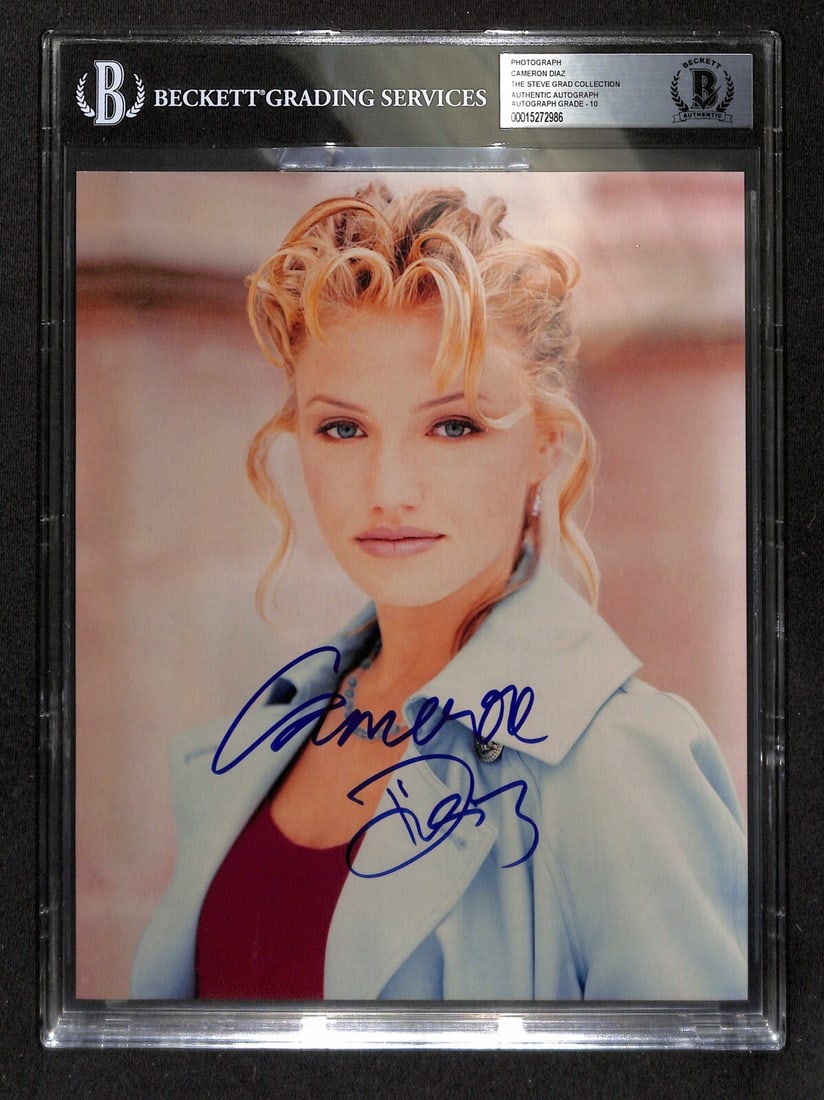 Cameron Diaz Signed 8x10 Photo Auto Grade 10 Beckett 1996: Cameron Diaz Signed 8x10 Photo Auto Grade 10 Beckett 1996 This is an original, autographed 8x10 color photograph of Cameron Diaz, signed in blue permanent marker. The signature, obtained in person in