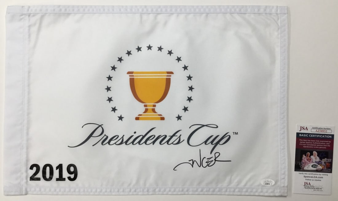 Abraham Ancer Signed The President's Cup 2019 Pin Flag JSA Authenticated: Abraham Ancer Signed The President's Cup 2019 Pin Flag JSA Authenticated Celebrate the excitement of golf with this official The President's Cup 2019 pin flag, signed by PGA star Abraham Ancer. The si
