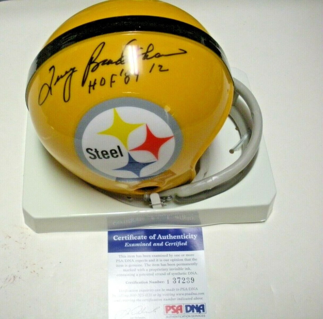 Terry Bradshaw Signed Mini Helmet PSA DNA HOF 89 Pittsburgh Steelers: Terry Bradshaw Signed Mini Helmet PSA DNA HOF 89 Pittsburgh Steelers This officially licensed mini helmet celebrates Terry Bradshaw, the legendary quarterback of the Pittsburgh Steelers. Hand-signed b