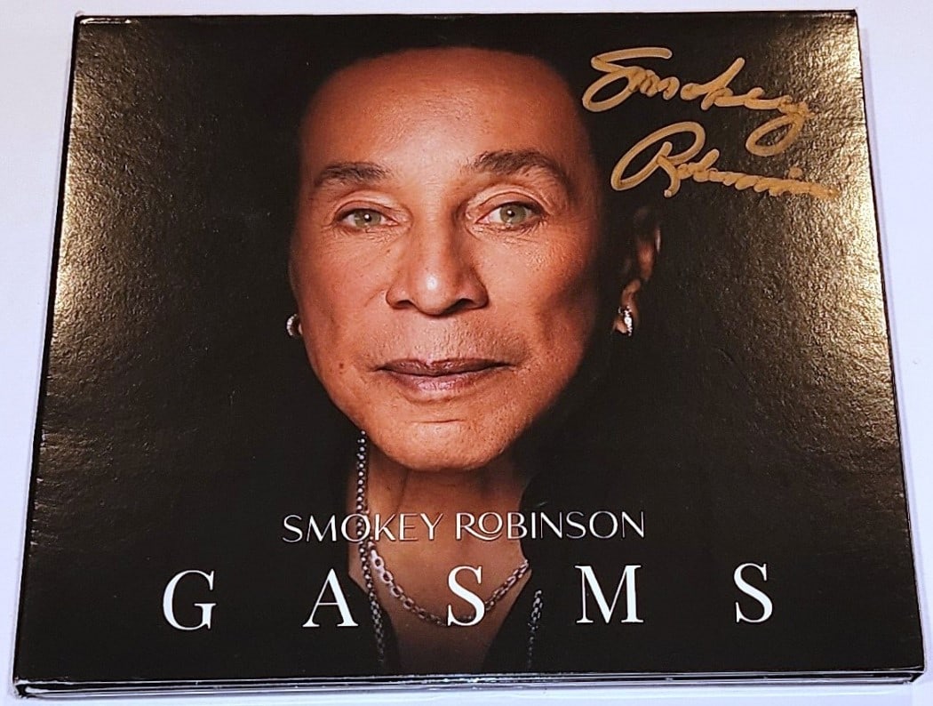 Smokey Robinson Gasms CD Signed Gold Signature JSA Authentication: Smokey Robinson Gasms CD Signed Gold Signature JSA Authentication This is an original CD and booklet of Smokey Robinson's album "Gasms," featuring a stunning gold signature from the iconic artist. The