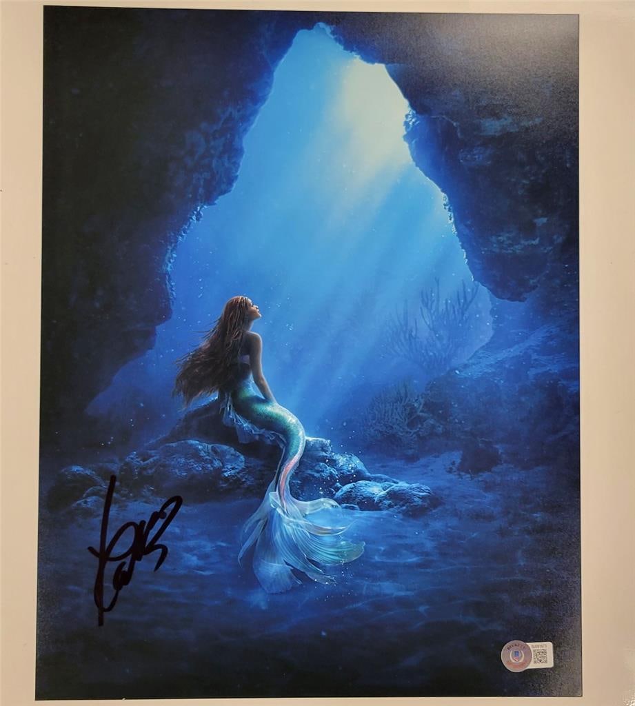 Halle Bailey Signed The Little Mermaid 11x14 Photo Beckett Authenticated: Halle Bailey Signed The Little Mermaid 11x14 Photo Beckett Authenticated This is an original 11x14 photograph of Halle Bailey, featuring her autograph authenticated by Beckett. The image captures a mo