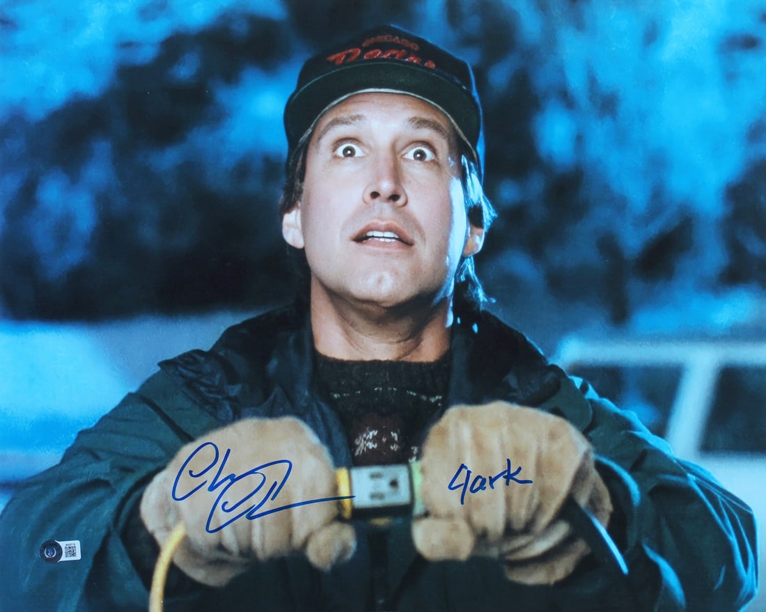 Chevy Chase Signed 16x20 Christmas Vacation Photo BAS Authenticated: Chevy Chase Signed 16x20 Christmas Vacation Photo BAS Authenticated This stunning 16x20 photograph features Chevy Chase as 'Clark' from the beloved film National Lampoon's Christmas Vacation. The phot