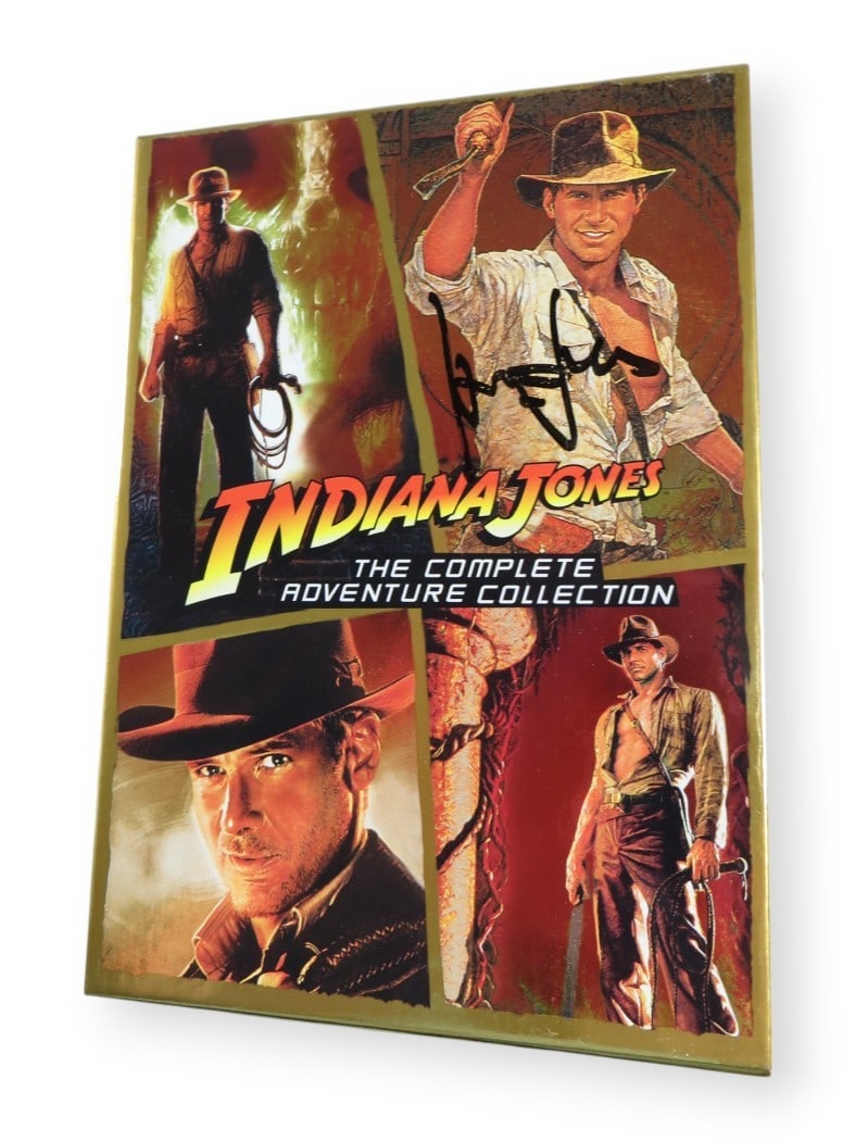 Harrison Ford Autographed Indiana Jones DVD Cover Beckett Authenticated: Harrison Ford Autographed Indiana Jones DVD Cover Beckett Authenticated This is an original DVD cover for the Indiana Jones Collection, autographed by the legendary actor Harrison Ford. The cover has