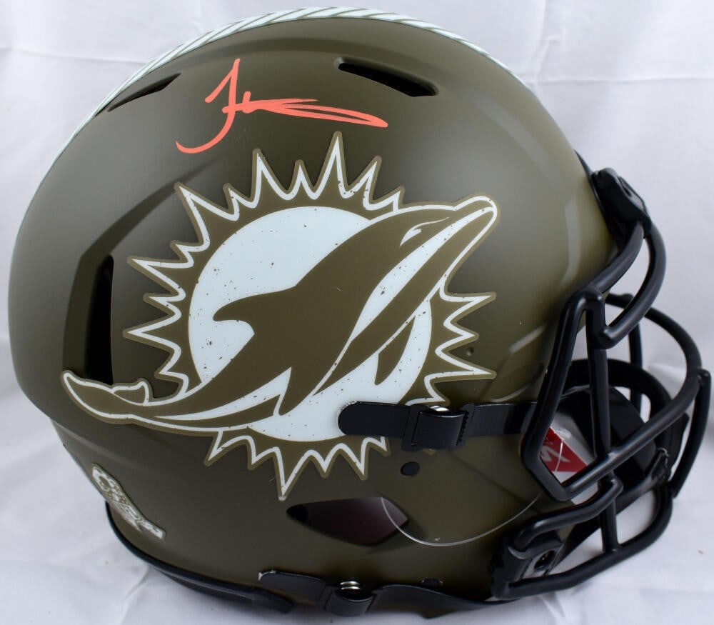 Tyreek Hill Signed Miami Dolphins Salute to Service Helmet Beckett Auth: Tyreek Hill Signed Miami Dolphins Salute to Service Helmet Beckett Auth This authentic Miami Dolphins helmet is signed by star player Tyreek Hill, commemorating the Salute to Service campaign. The hel
