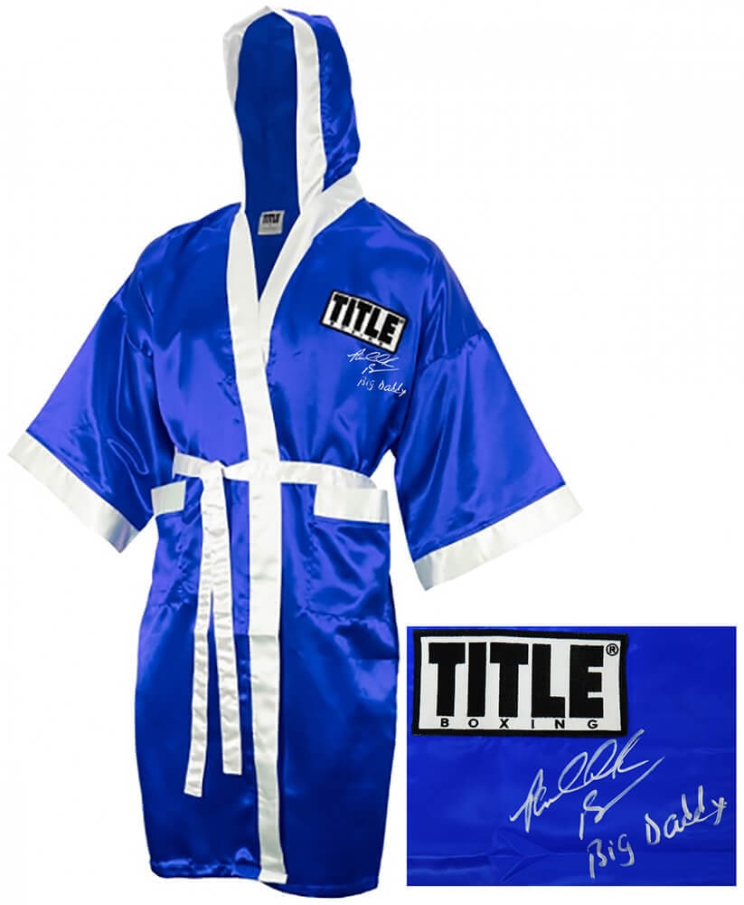 Riddick Bowe Signed Blue Boxing Robe Big Daddy Inscription COA: Riddick Bowe Signed Blue Boxing Robe Big Daddy Inscription COA This is a pre-owned Riddick Bowe signed Title blue boxing robe featuring the inscription 'Big Daddy'. The item is an original piece authe