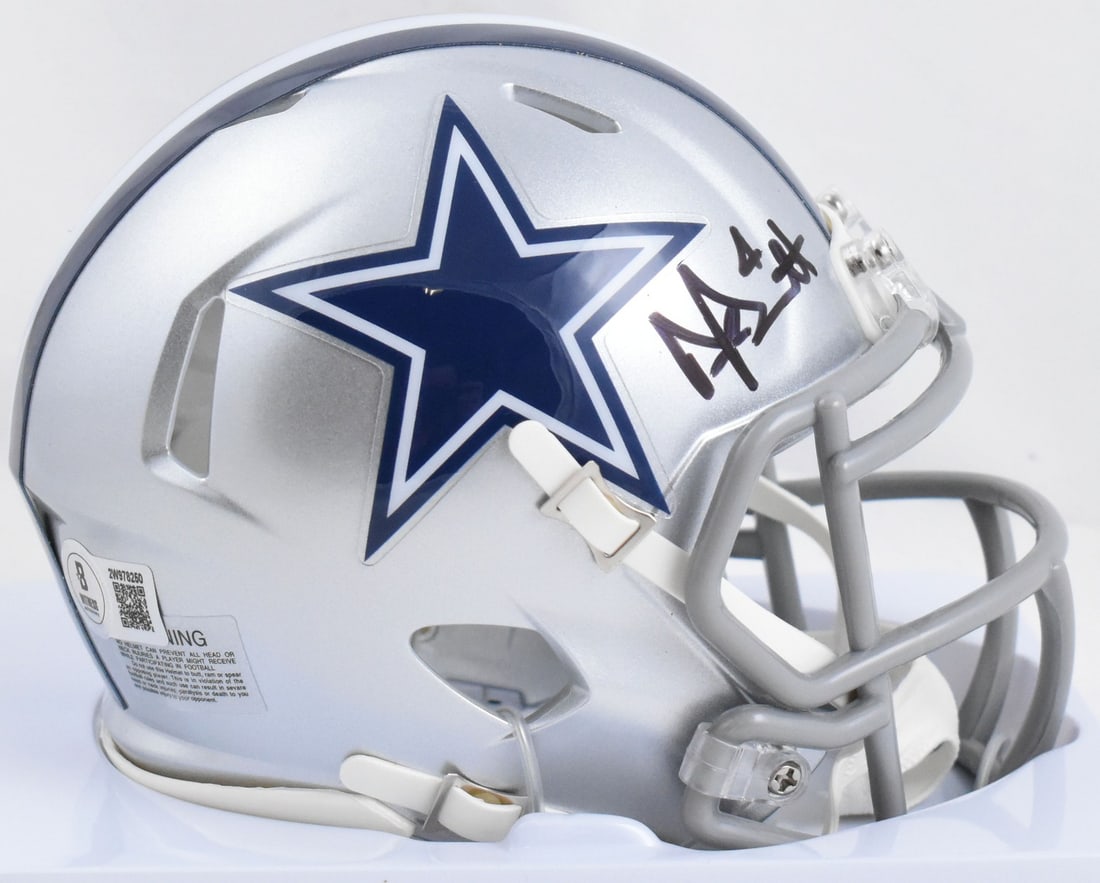 Dak Prescott Signed Cowboys Speed Mini Helmet Beckett Authenticated: Dak Prescott Signed Cowboys Speed Mini Helmet Beckett Authenticated This Dallas Cowboys Speed Mini Helmet is autographed by Dak Prescott, showcasing his signature for fans and collectors. The helmet i