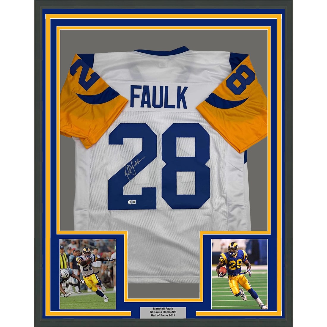 Marshall Faulk Signed St. Louis Rams Jersey in 35x39 Frame Beckett Authenticated: Marshall Faulk Signed St. Louis Rams Jersey in 35x39 Frame Beckett Authenticated This is a framed St. Louis Rams white jersey autographed by Marshall Faulk. The jersey has been professionally framed a