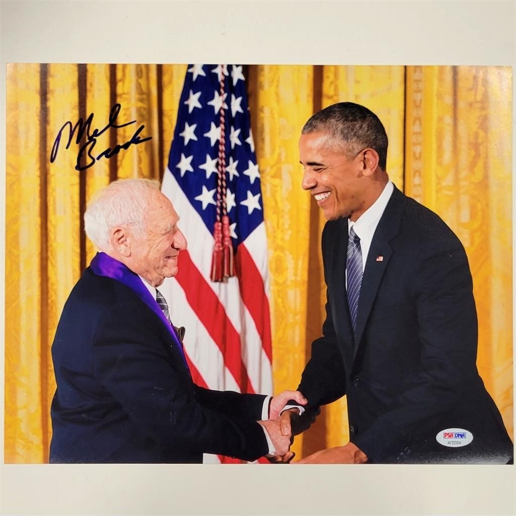 Olivia Munn Signed 11x14 Photo Mel Brooks JSA Authenticated: Olivia Munn Signed 11x14 Photo Mel Brooks JSA Authenticated This is an original 11x14 photograph featuring a Mel Brooks autograph, authenticated by James Spence (JSA). The photo is signed by Olivia Mu