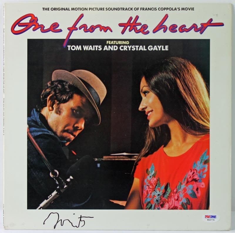 Tom Waits Authentic Signed One From The Heart Album PSA/DNA W46778: Tom Waits Authentic Signed One From The Heart Album PSA/DNA W46778 This is an authentic signed album cover of "One From The Heart" by Tom Waits, certified by PSA/DNA. The album cover features the icon
