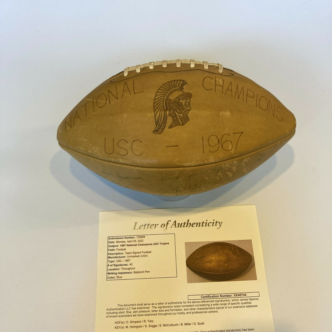 1967 USC Trojans Team Signed Football with O.J. Simpson JSA COA: 1967 USC Trojans Team Signed Football with O.J. Simpson JSA COA This is a 1967 USC Trojans NCAA National Champions team signed football featuring 40 signatures, including that of O.J. Simpson. It is a